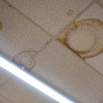 check for water damage signs on inside ceiling tiles and outside on the roof and exterior of the building |services by A&J Property Restoration DKI of Madison, Middleton, Sun Prairie, Portage, Waunakee, Milwaukee, WI Dells, Fort Atkinson, Watertown, and Waukesha, Wisconsin